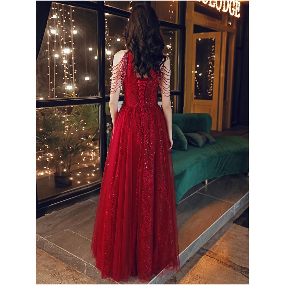 Wine red wedding dress for brides exuding elegance and sophistication featuring delicate tassels on the shoulders a touch of understated luxury image 5