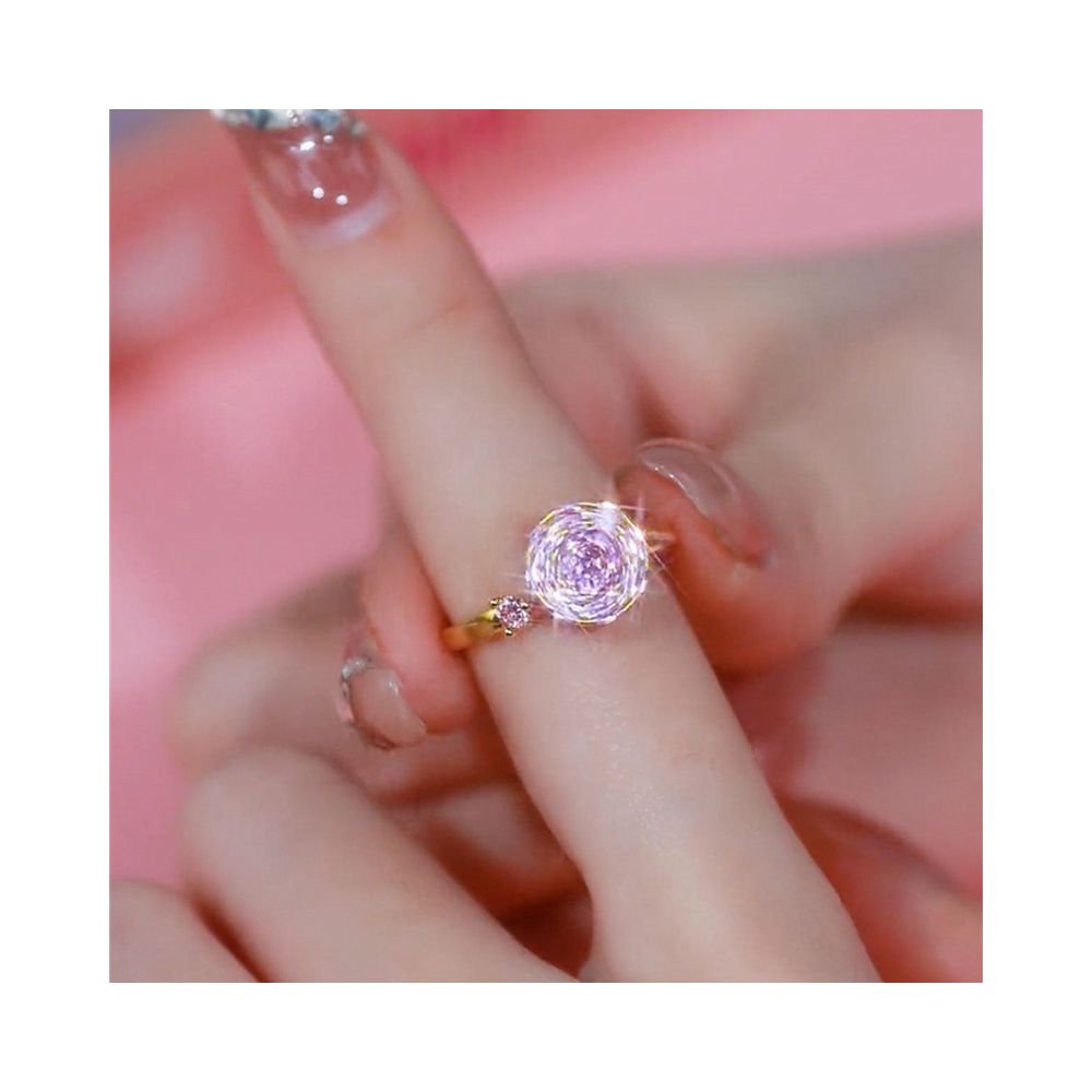 High end trending on TikTok this elegant luxurious and fashionable rotating pink ring is super sparkly with full diamonds and an open design perfect for women