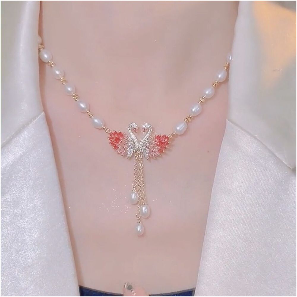Japanese and Korean style 2026 new swan pink pearl necklace women s high end design fashionable cheongsam sweater chain