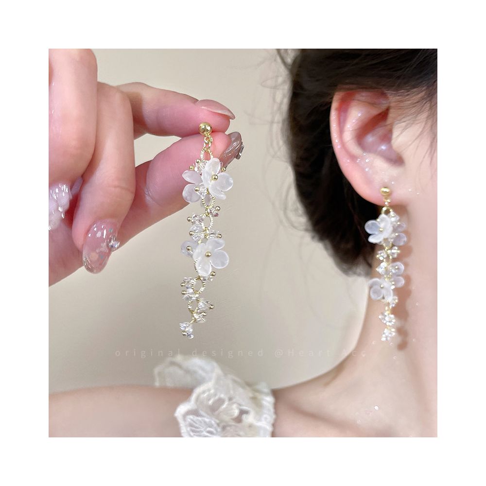 Exquisite flower tassel earrings for women 2025 new seaside vacation style earrings suitable for high end earrings with square and round faces