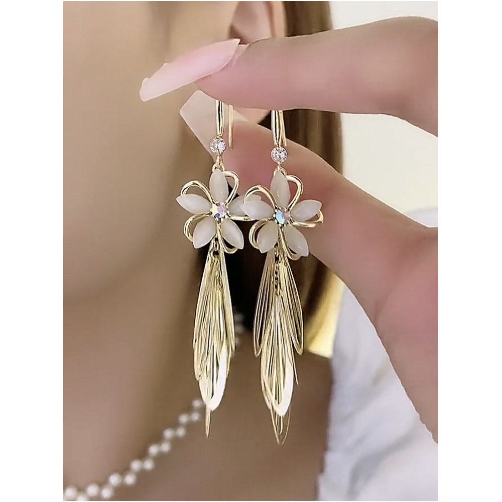New Japanese and Korean earrings with high end and fashionable temperament cat s eye stone flower tassel earrings women s long tassel earrings image 0