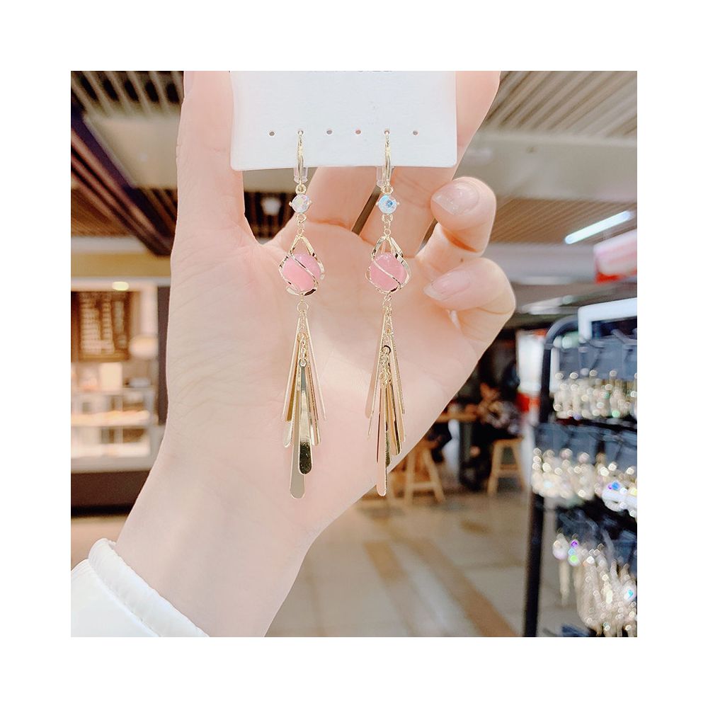 Japanese and Korean internet famous trendy tassel sequin earrings for women with a high end temperament and a long personalized fashionable and versatile earring design