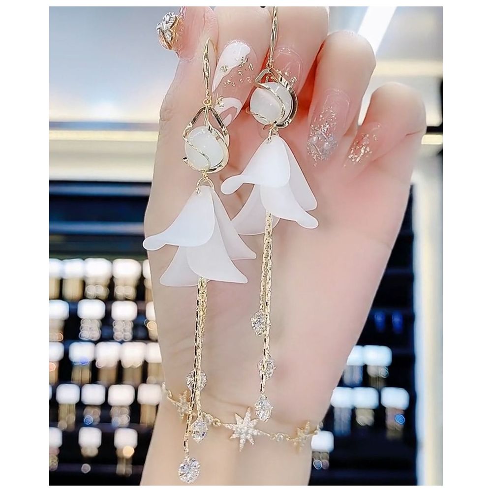 Flower white dress cat eye stone elegant earrings tassel long style 2024 new explosive anti allergic earrings image 1